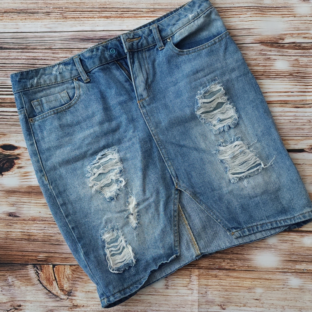 Knee Length Distressed Denim Skirt